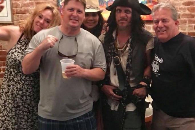 a group of people posing for the camera