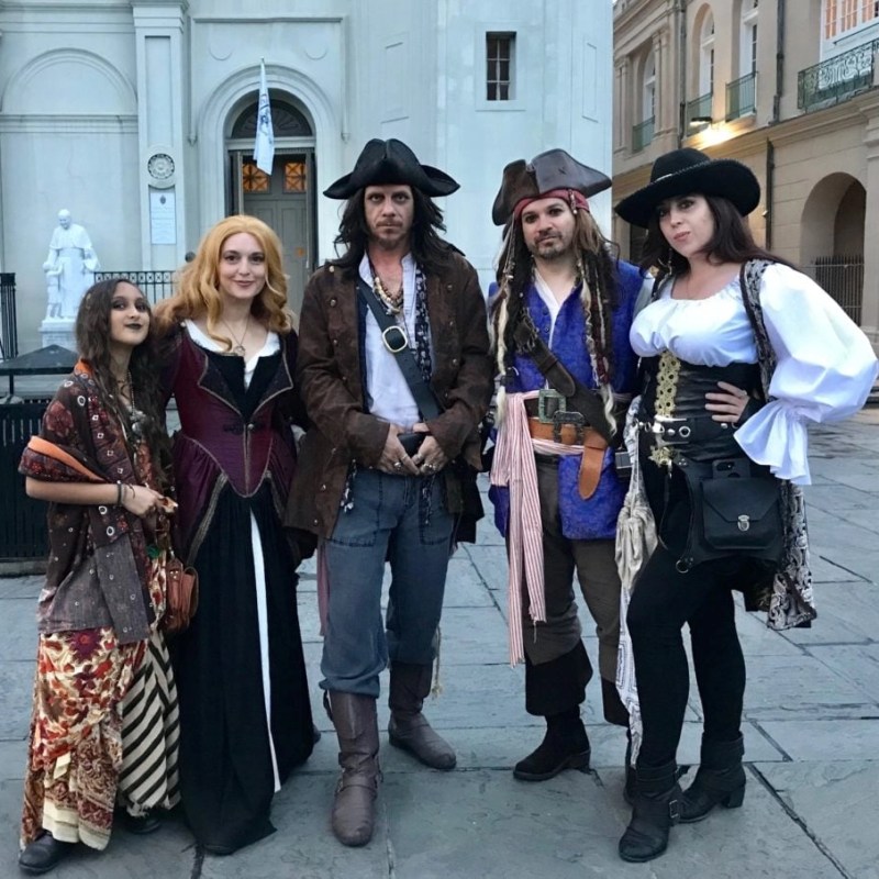 Shobhna Samarth et al. standing on a sidewalk