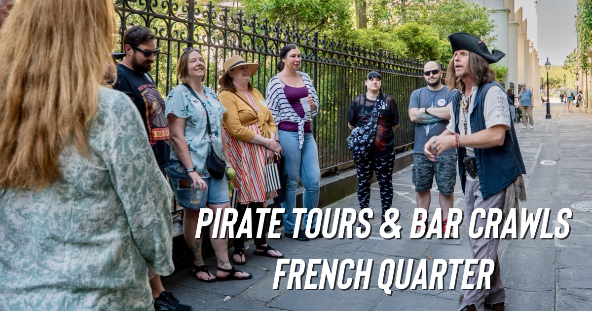Pirate tour group Tour guide in pirate costume leads a group on a city street walk.